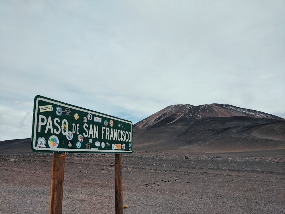 a street sign in the middle of a desert