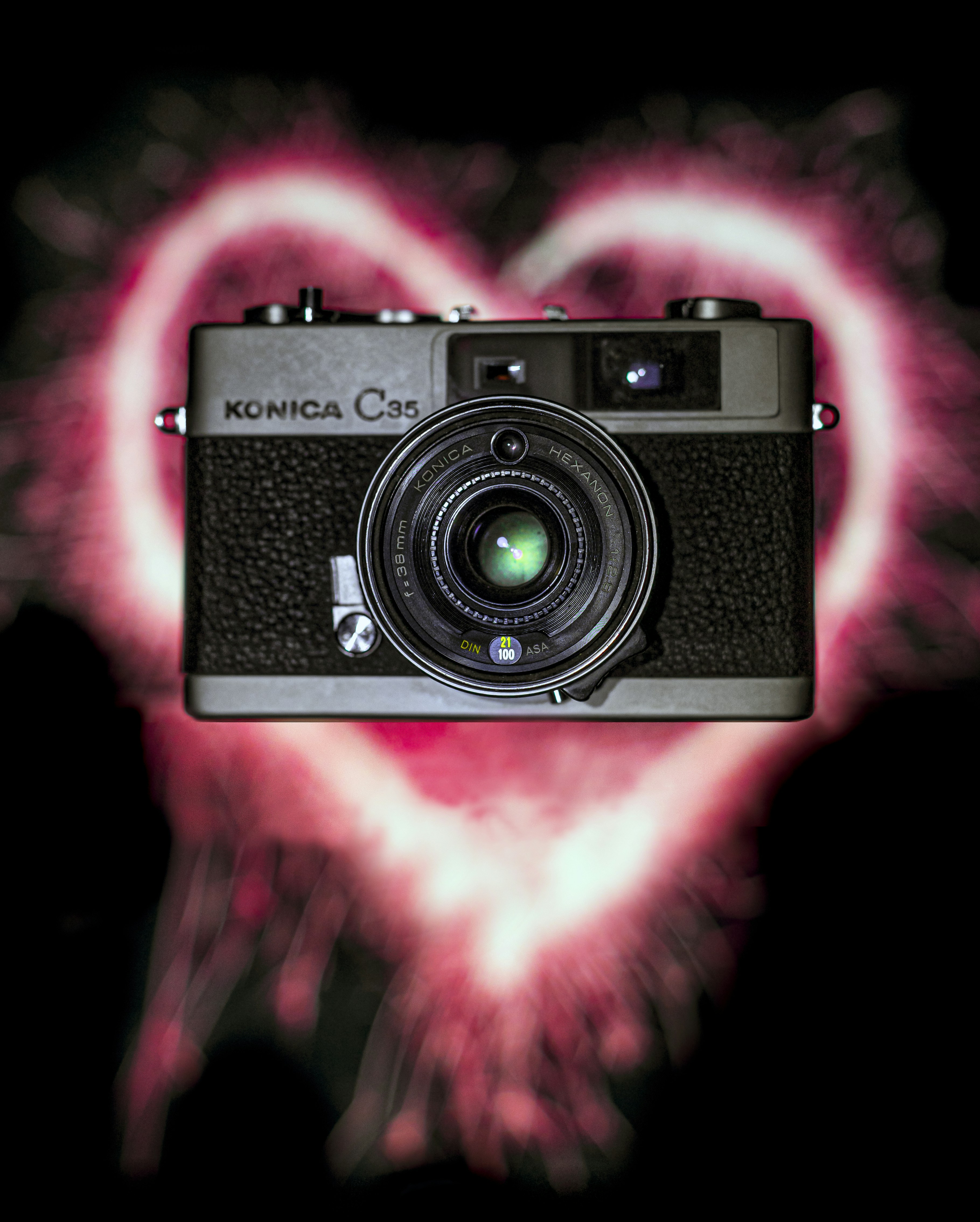 A camera in the shape of a heart photo – Free Human Image on Unsplash