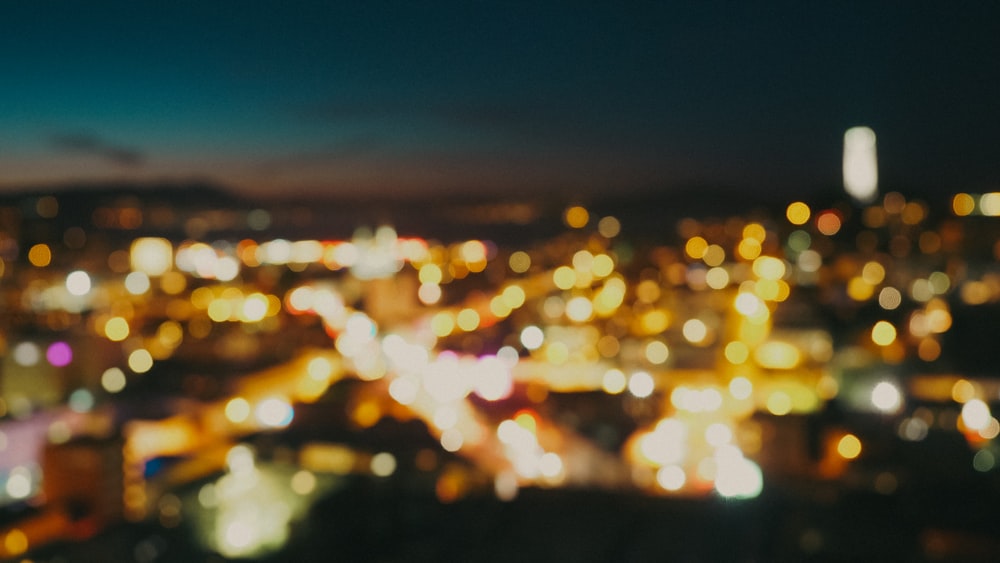 a blurry photo of a city at night