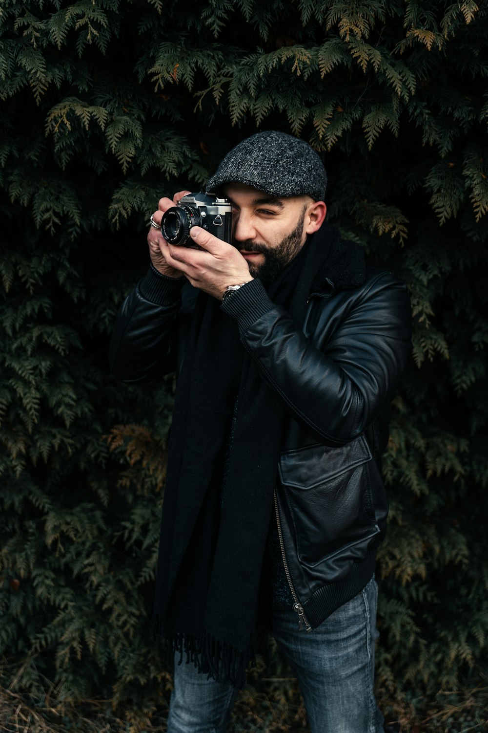 a man taking a picture with a camera