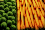 Close-up of colorful fresh fruits and vegetables neatly arranged