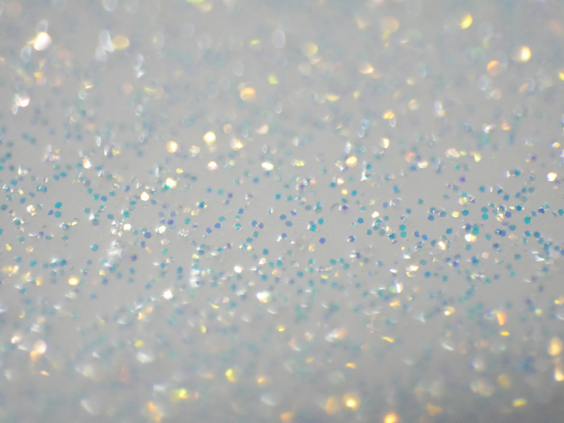 a white background with a lot of glitter