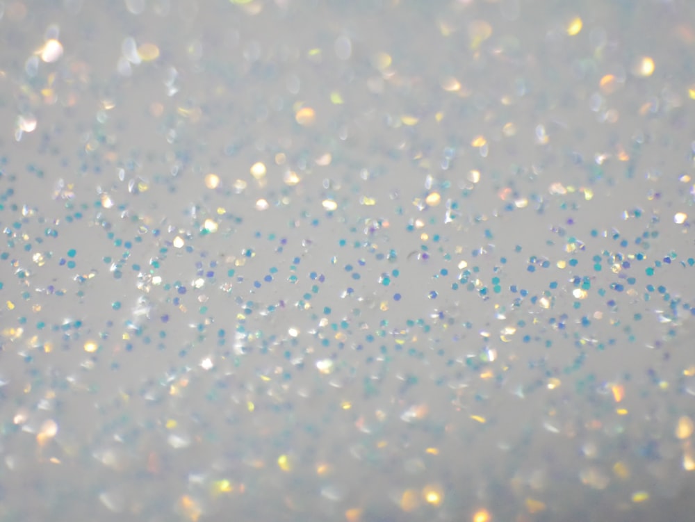 A white background with a lot of glitter photo – Free Design Image