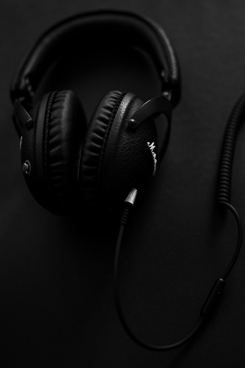 a pair of headphones sitting on top of a table