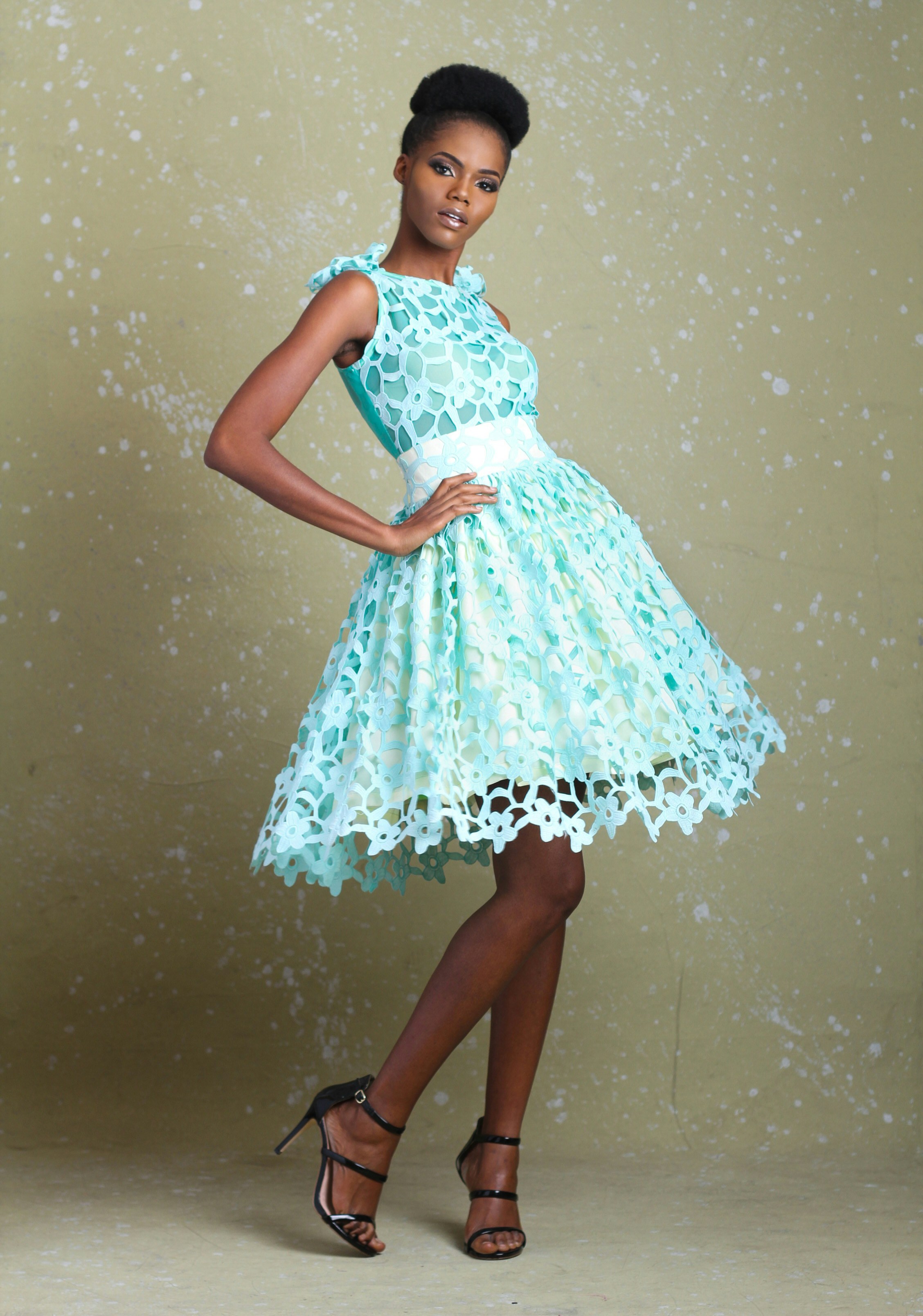 a woman in a dress posing for a picture