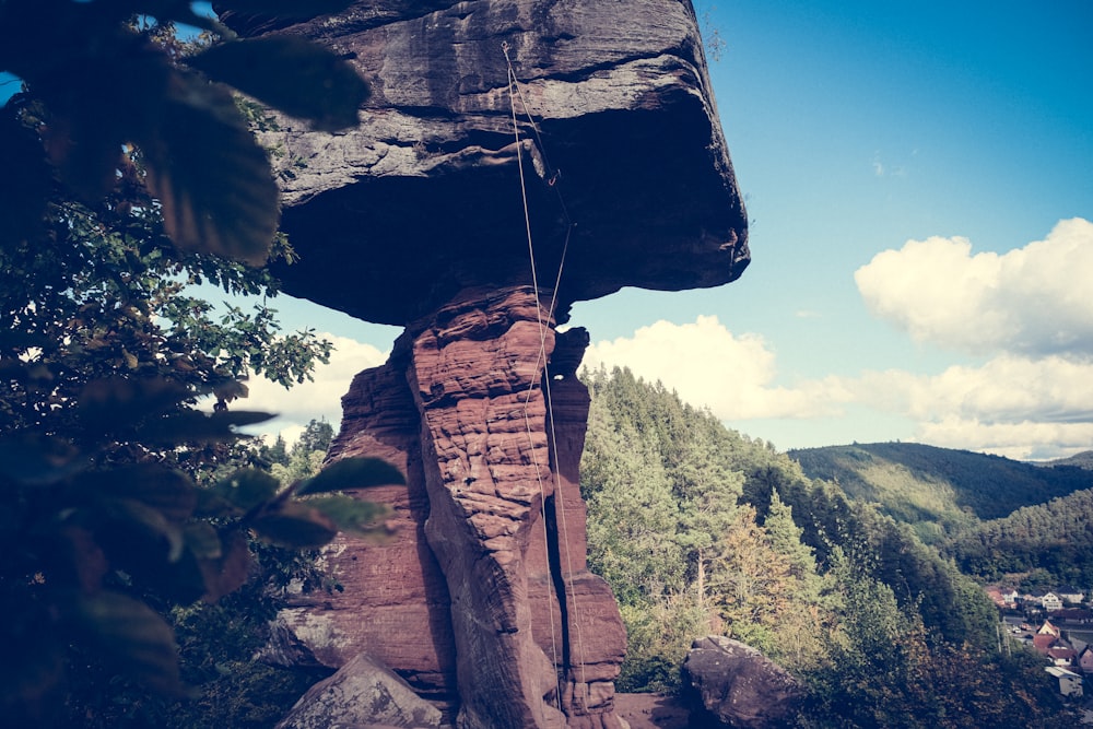 a rock formation with a rope attached to it