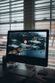 a desktop computer sitting on top of a desk