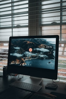 a desktop computer sitting on top of a desk