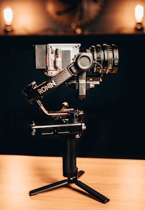 a camera sitting on top of a tripod