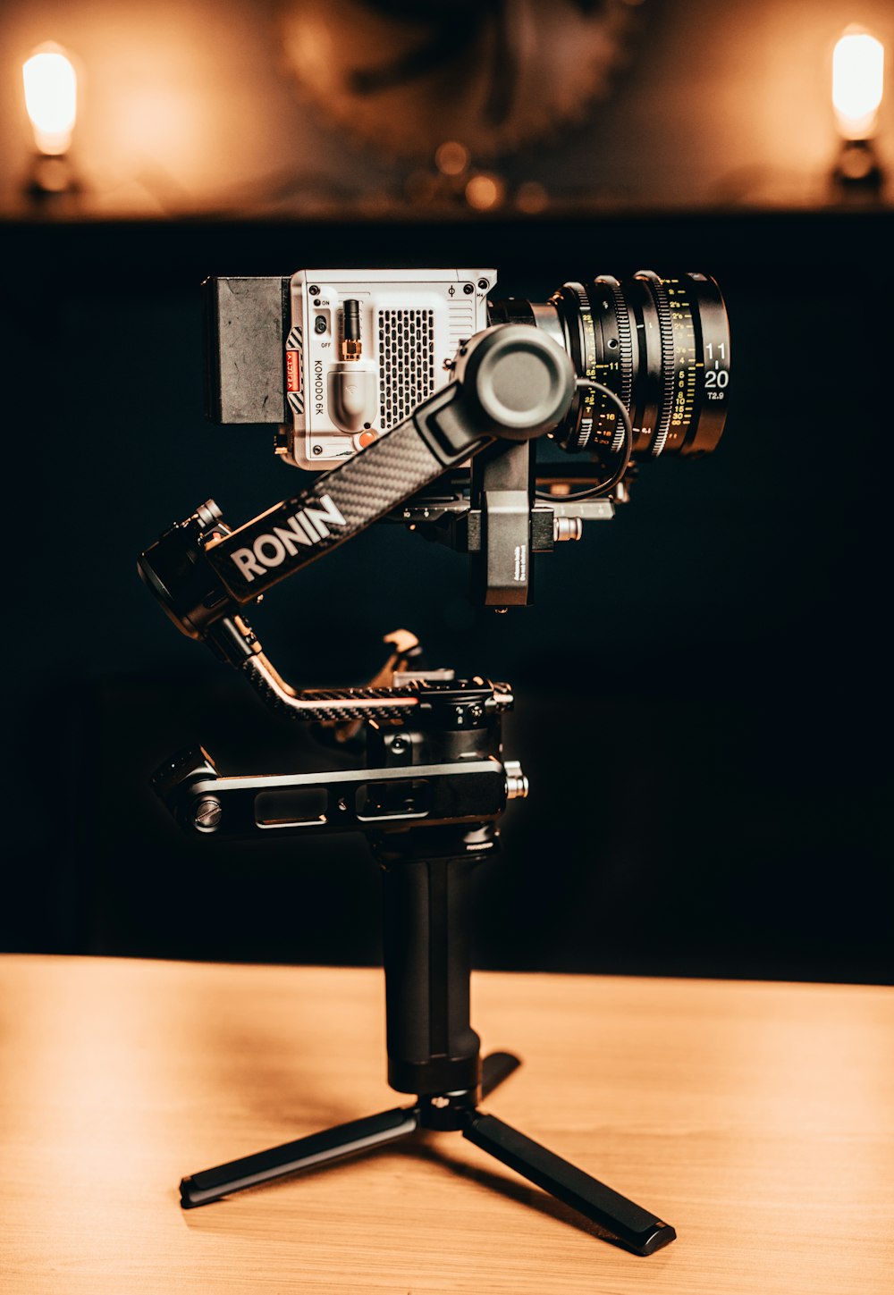 a camera sitting on top of a tripod