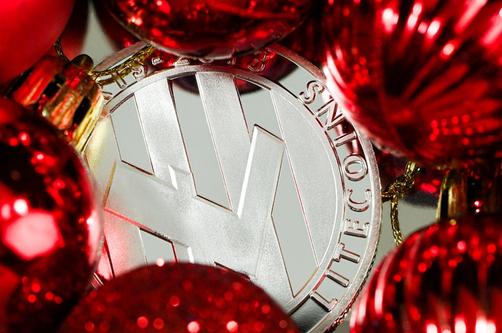 a close up of a red christmas ornament