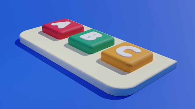 a close up of a remote control on a blue background