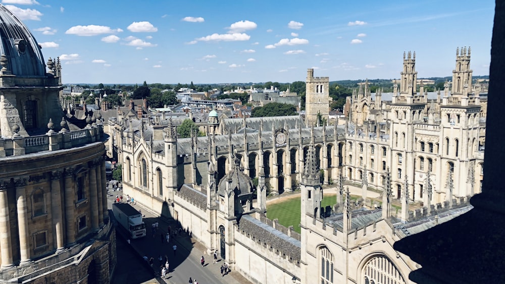 an aerial view of a large building with a clock tower