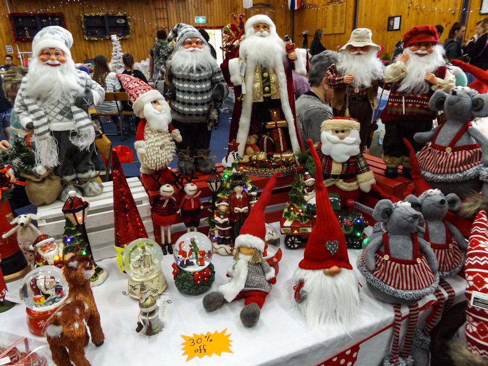 a table topped with lots of christmas decorations