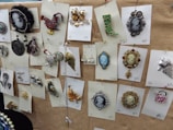 a bunch of jewelry is hanging on a wall