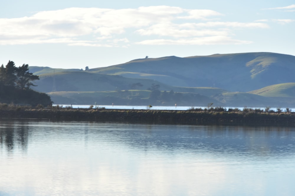 a large body of water surrounded by mountains