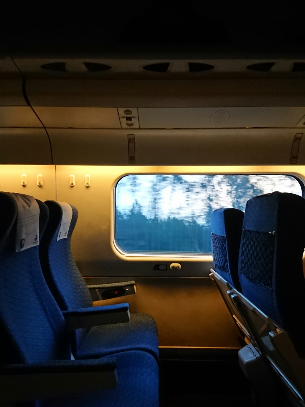 a view of the inside of an airplane looking out the window