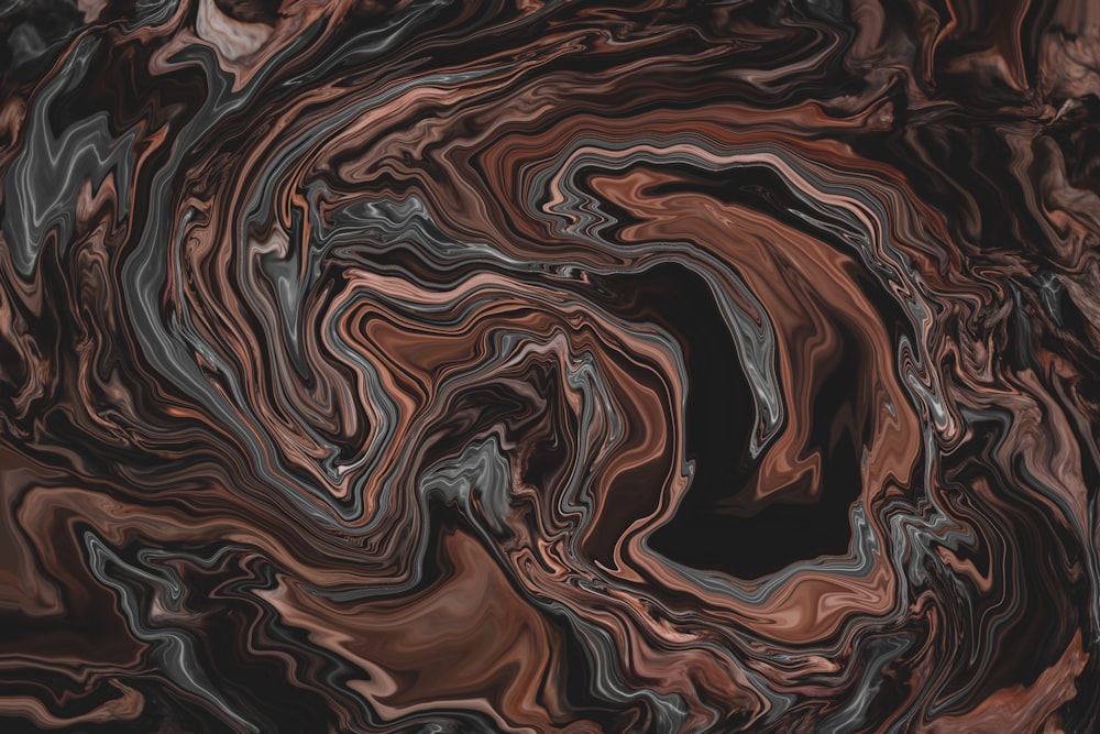 a black and brown abstract background with wavy lines