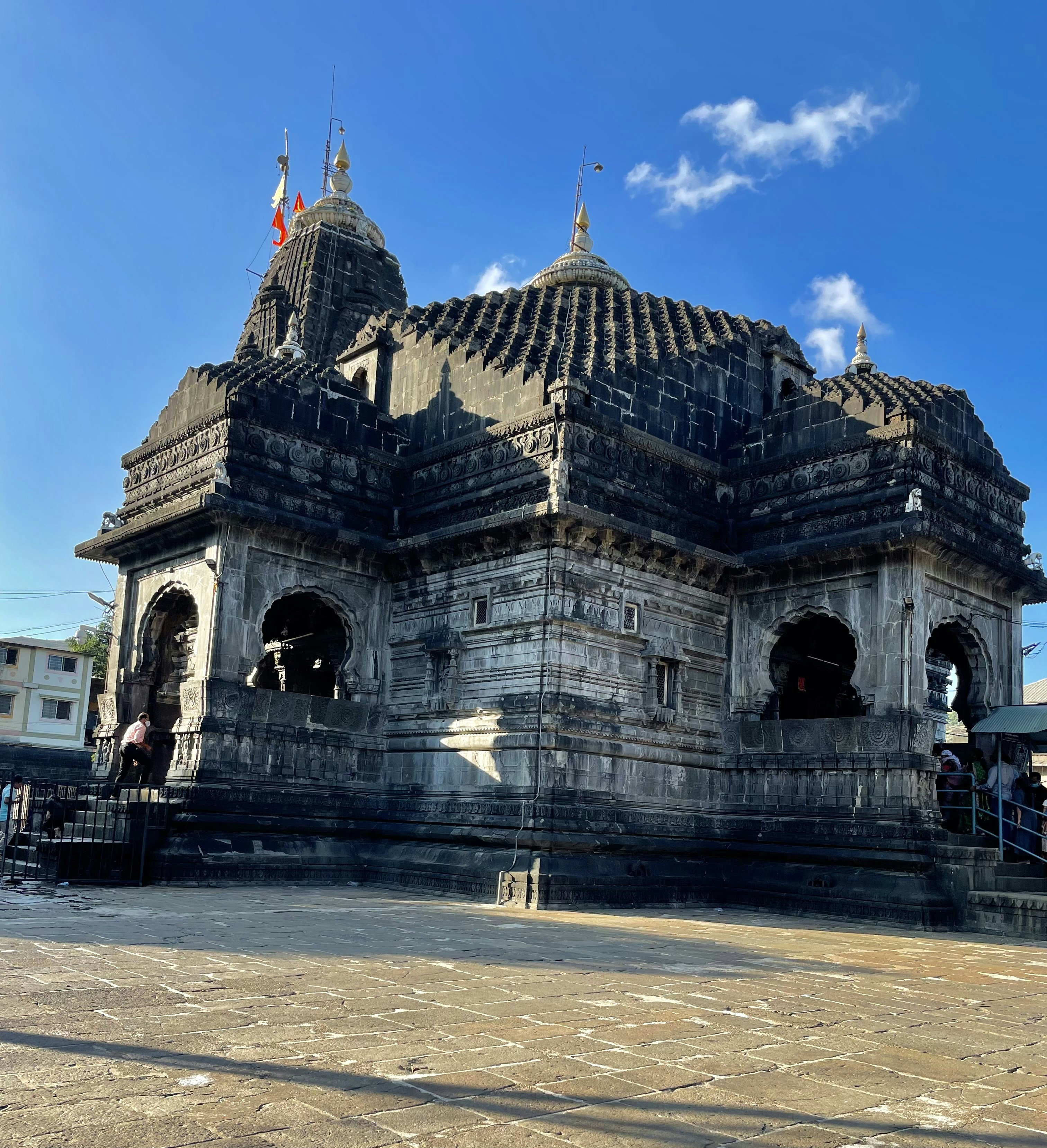 A large building with a clock tower on top of it photo – Free ...