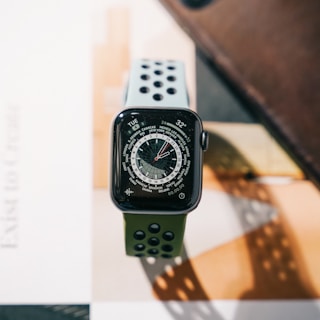 an apple watch sitting on top of a table