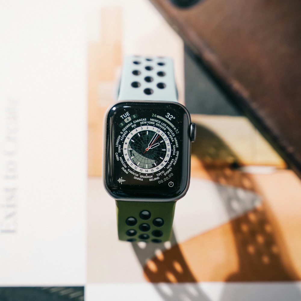 an apple watch sitting on top of a table