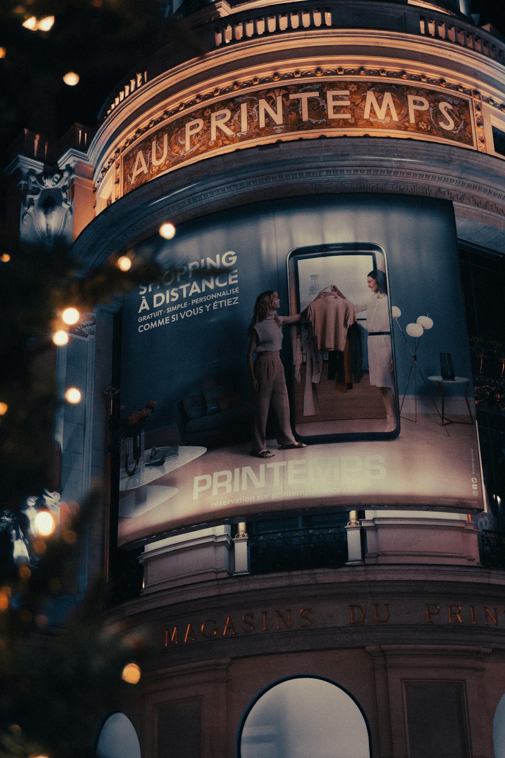 a christmas tree with a large advertisement on it