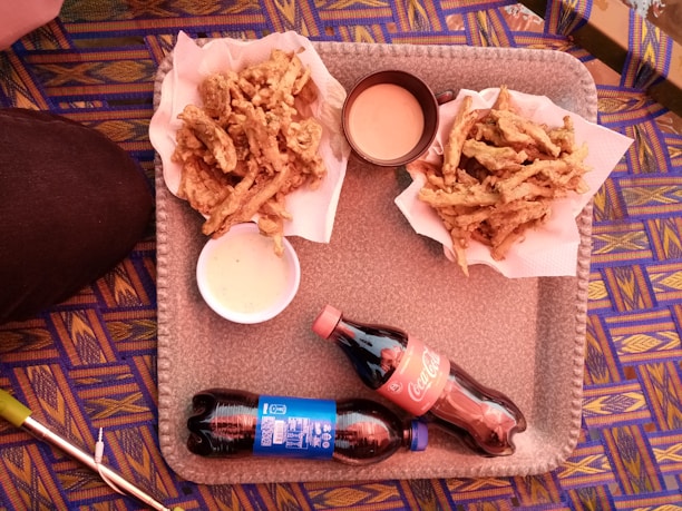 A colorful tray filled with a variety of Meal For You fast food items, ready to be shared.