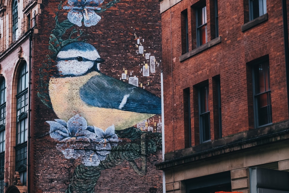 a bird painted on the side of a building