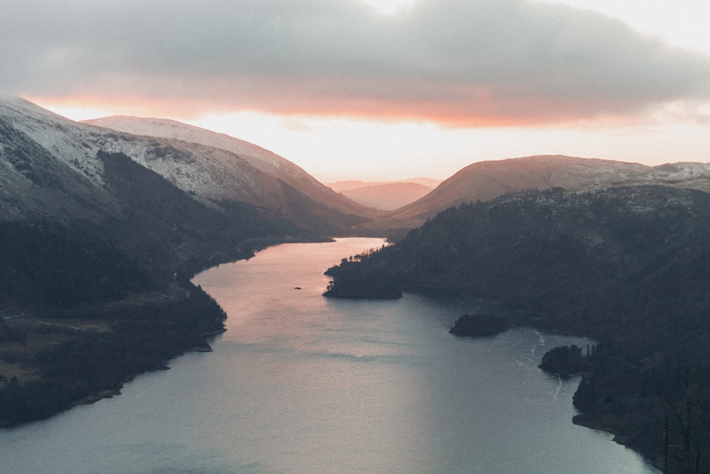 a large body of water surrounded by mountains