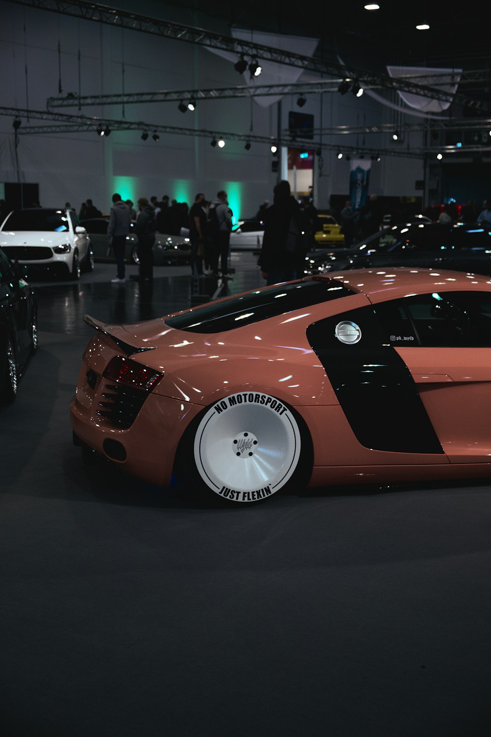 a very nice looking car in a big room