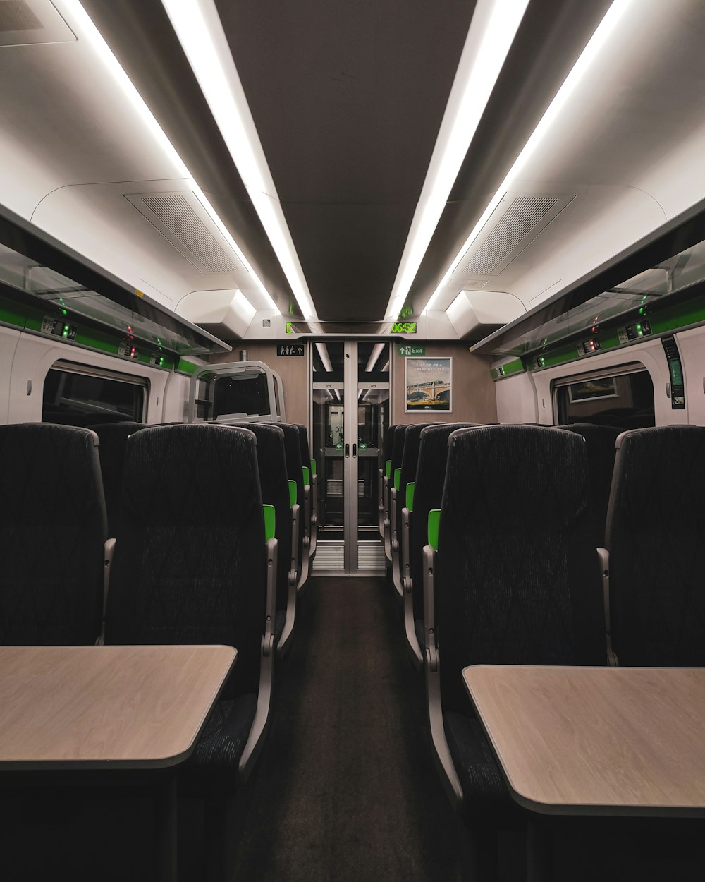 a view of the inside of a commuter train
