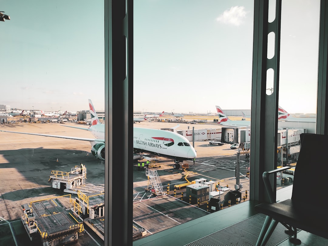 a large jetliner sitting on top of an airport tarmac,