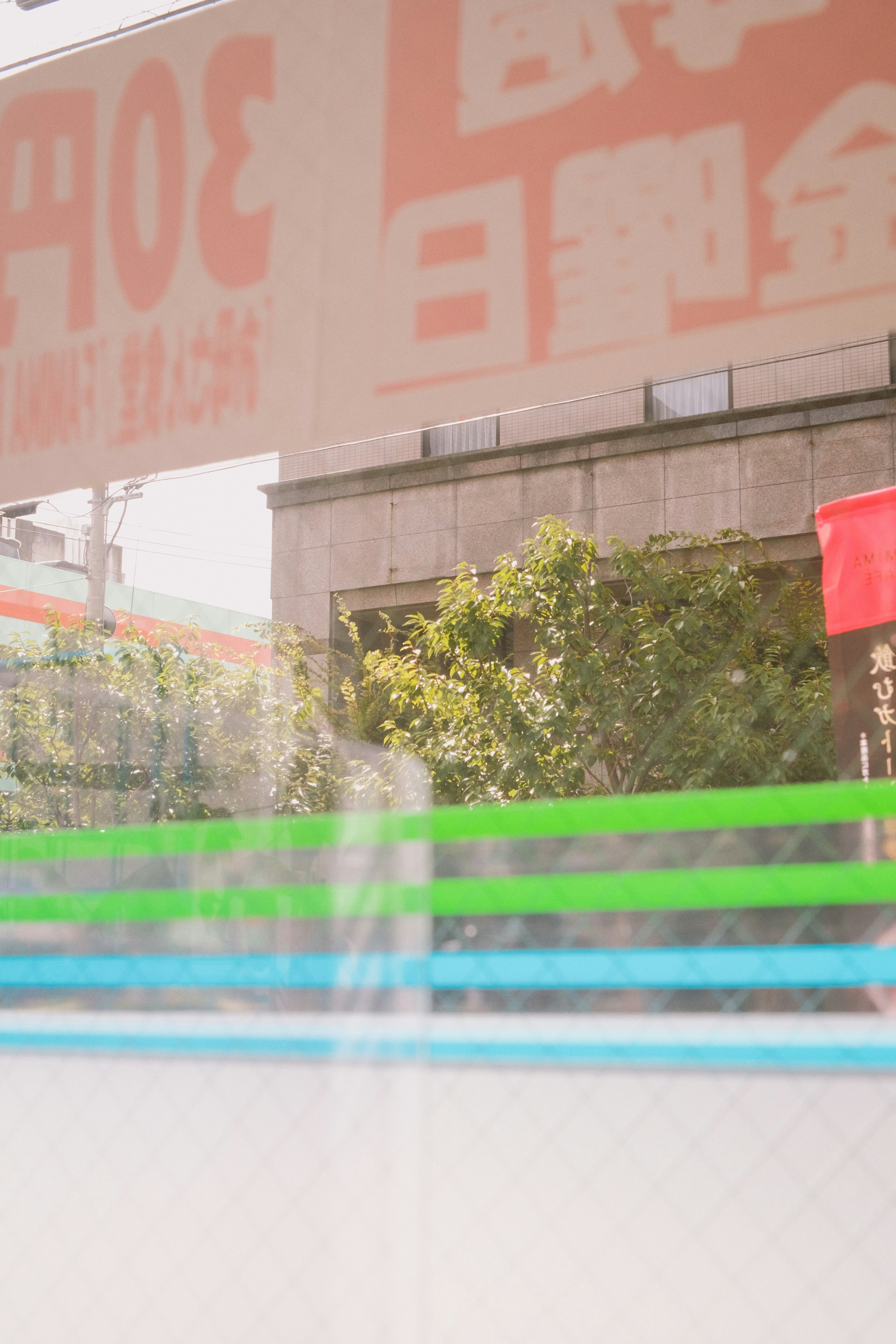 A stop sign in front of a building photo – Free Text Image on Unsplash