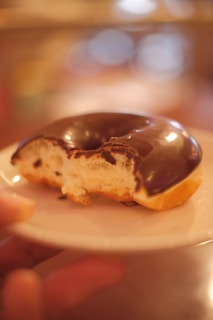 a close up of a doughnut on a plate