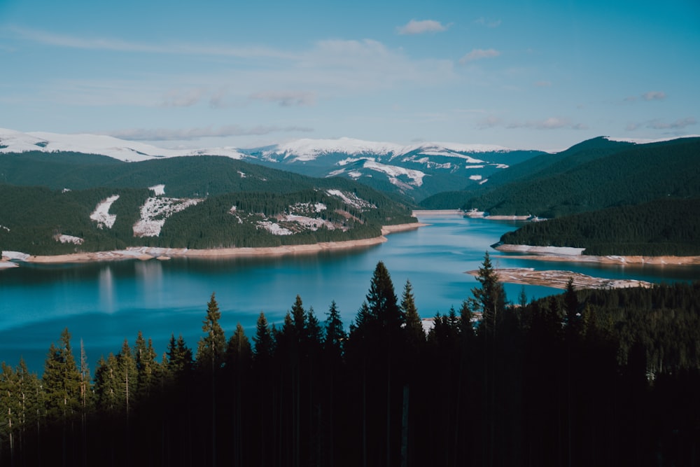 a large body of water surrounded by mountains