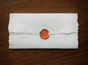 a wax stamp on a piece of paper
