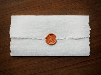 a wax stamp on a piece of paper
