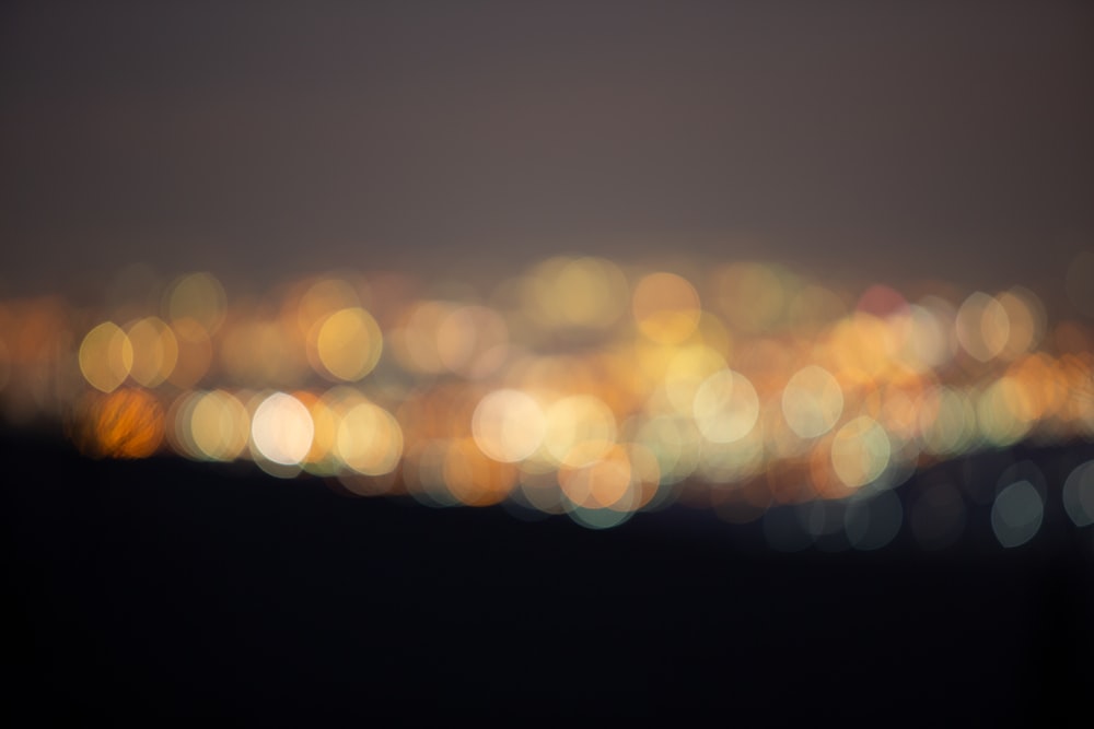 a blurry photo of a city at night