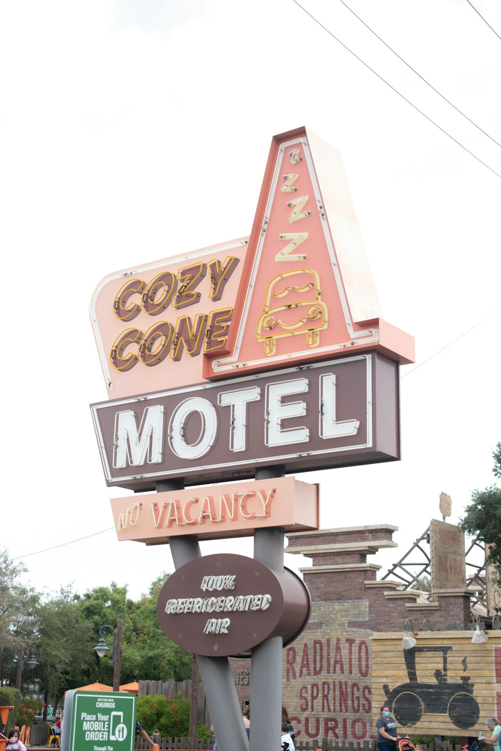 a motel sign in front of a building