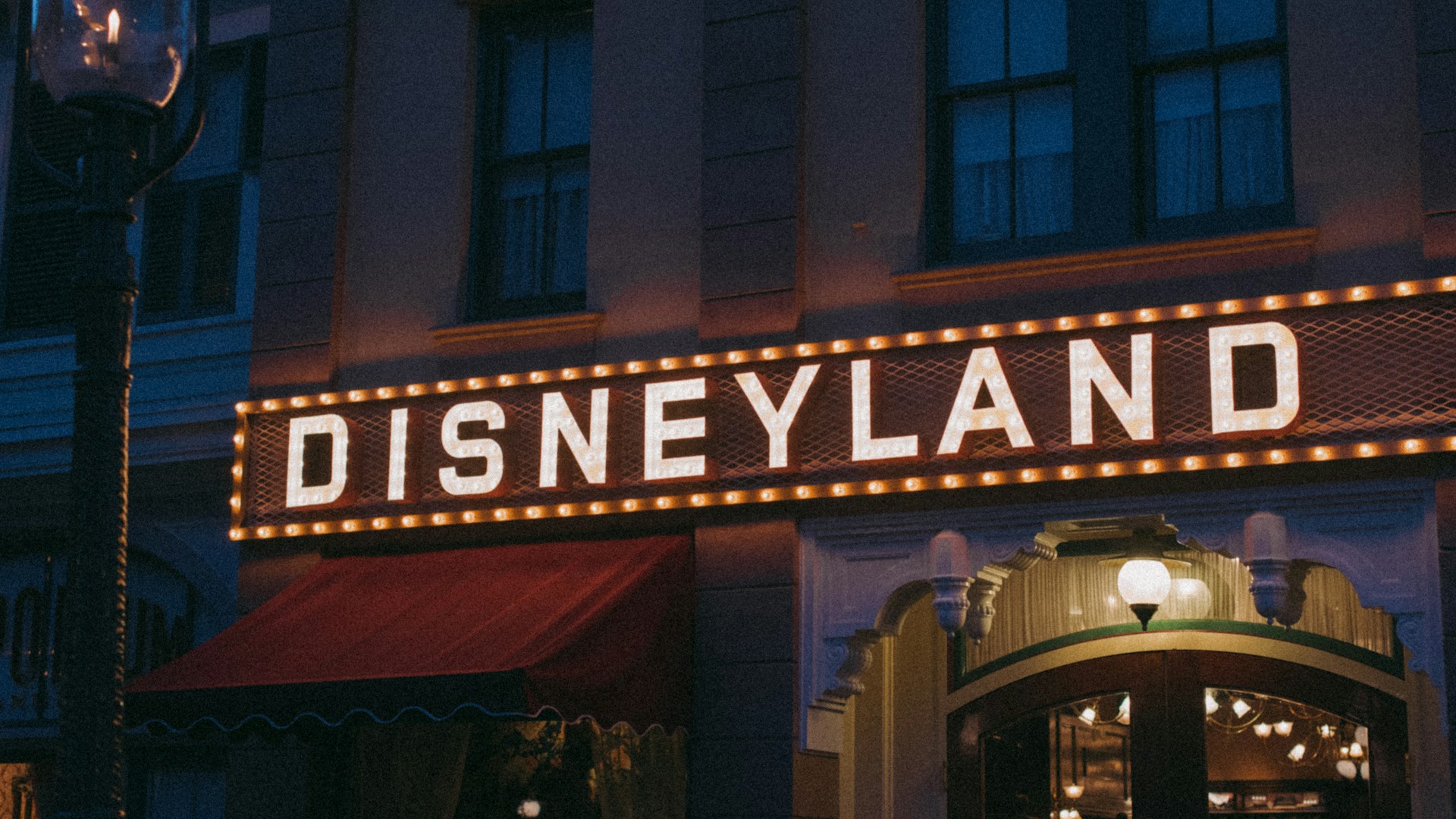 a building with a sign that says disneyland on it