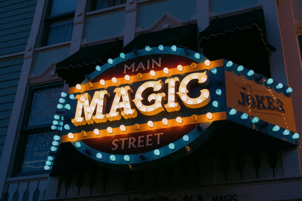 a neon sign that says main magic street