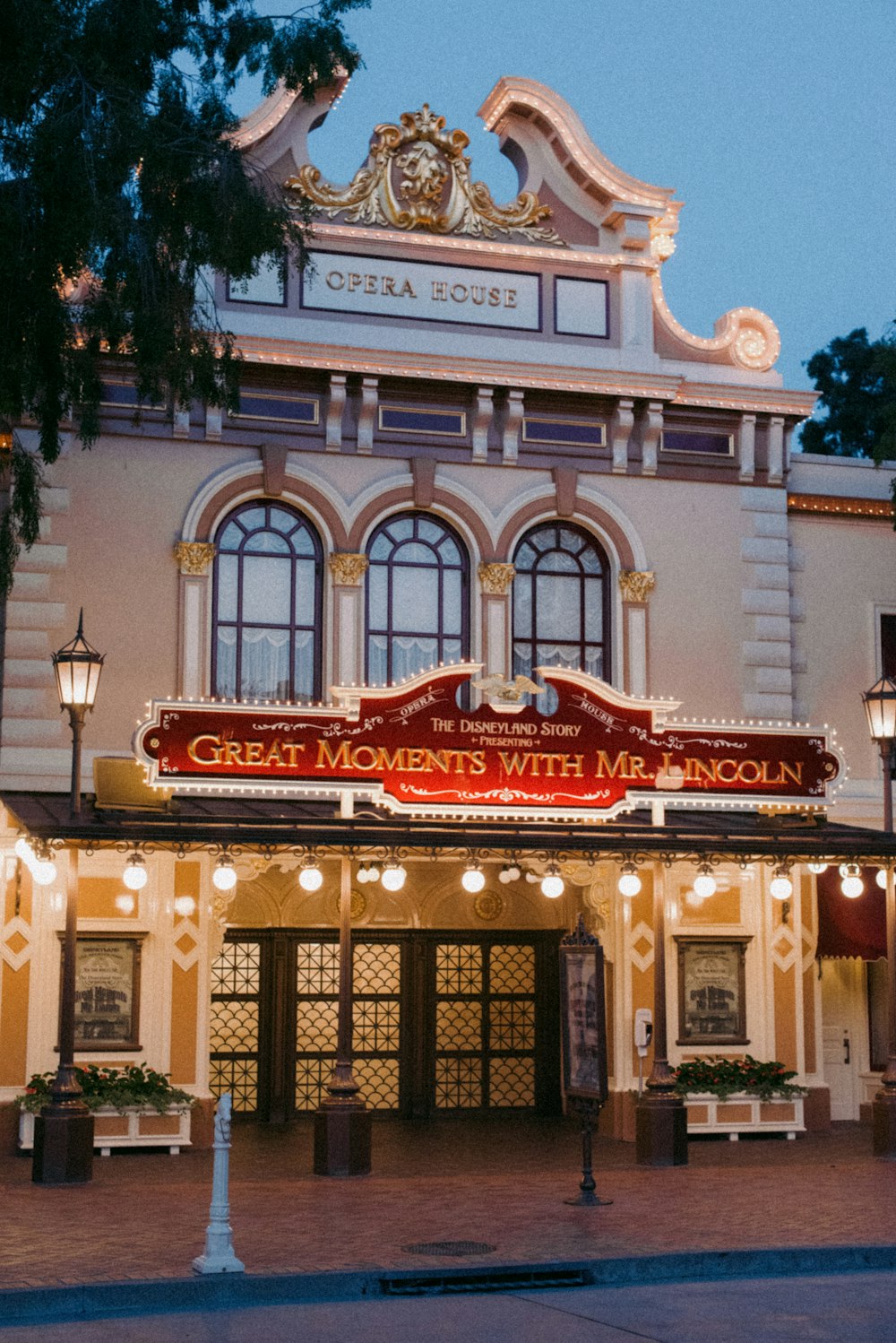 a large building with a sign that says great moments with madison