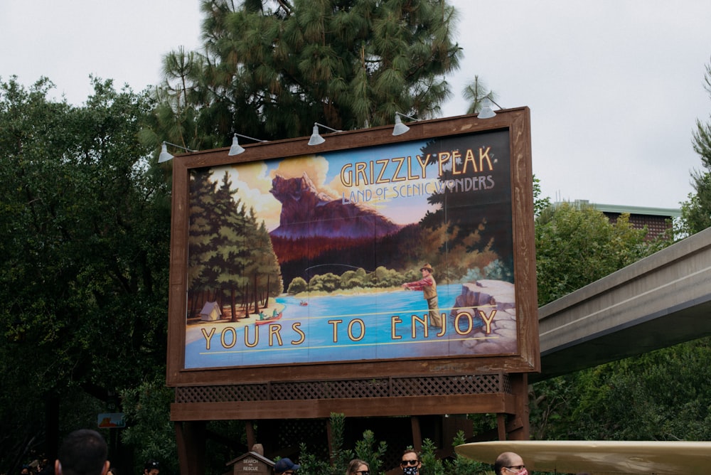 a sign advertising a tour to the park