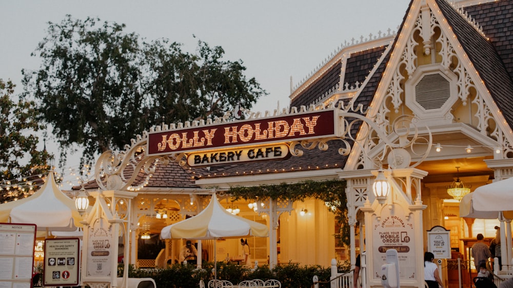 a large white building with a sign that says holiday bakery cafe