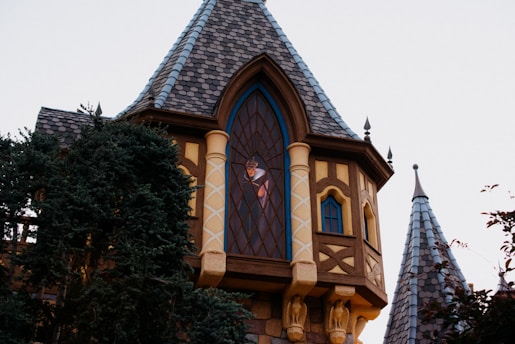 a tall building with a clock on it's side