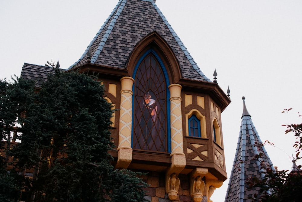 a tall building with a clock on it's side