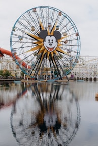 a ferris wheel with a mickey mouse face on it