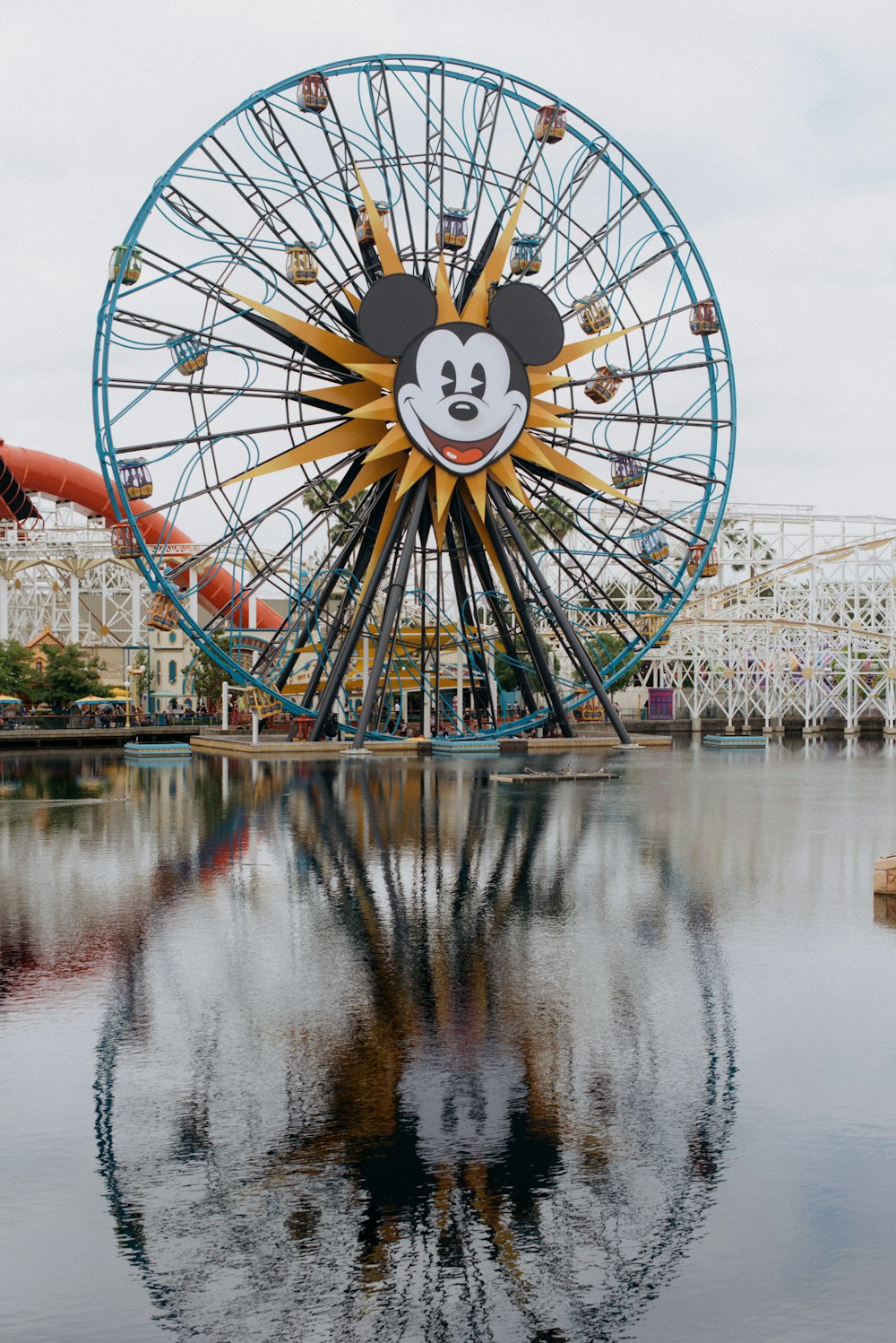 a ferris wheel with a mickey mouse face on it