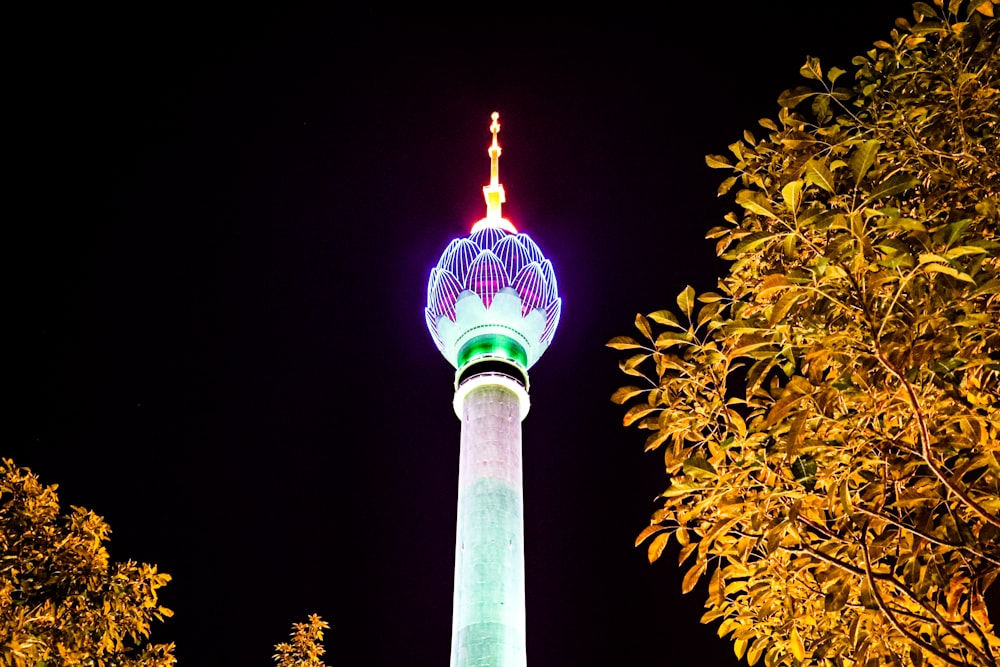 a tall tower with a light on top of it