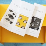 a pair of socks with pictures of animals on them